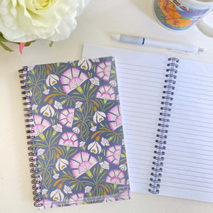 Carnation & Snowdrop Soft Cover Notebook is 5.5 x 8.5 inches and 80 College Ruled Pages.