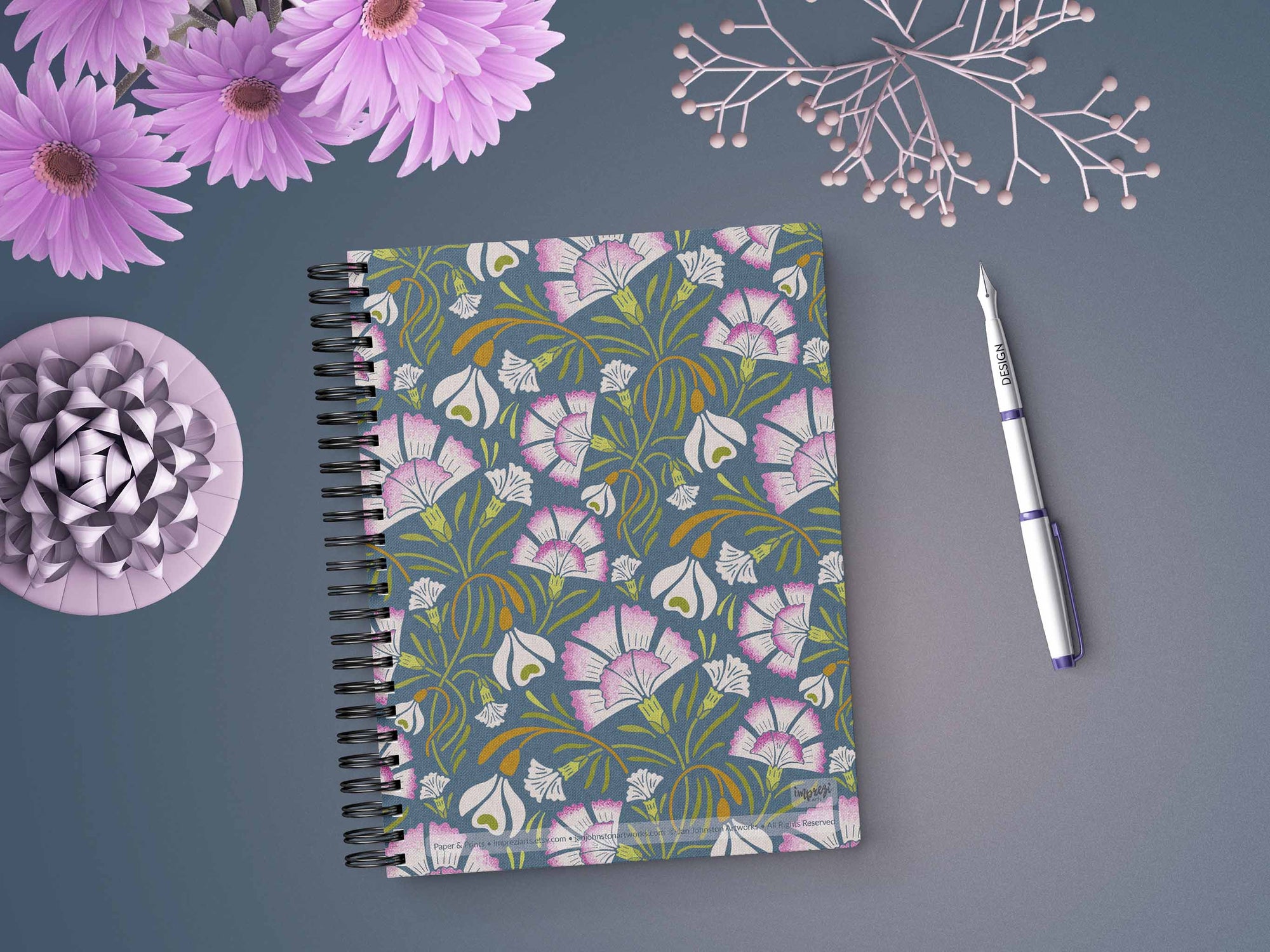 Carnation & Snowdrop Soft Cover Notebook is 5.5 x 8.5 inches and 80 College Ruled Pages.