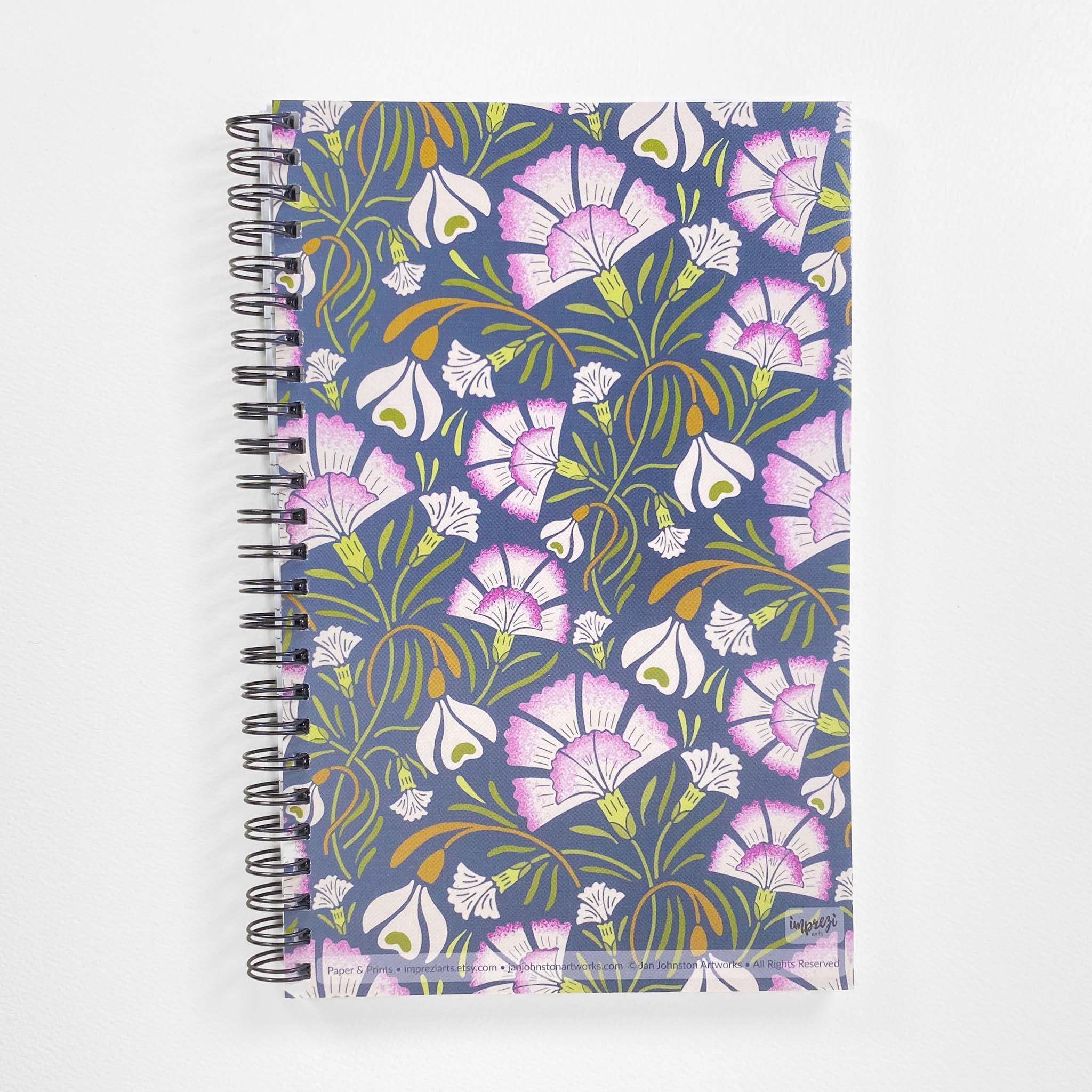 Carnation & Snowdrop Soft Cover Notebook is 5.5 x 8.5 inches and 80 College Ruled Pages.