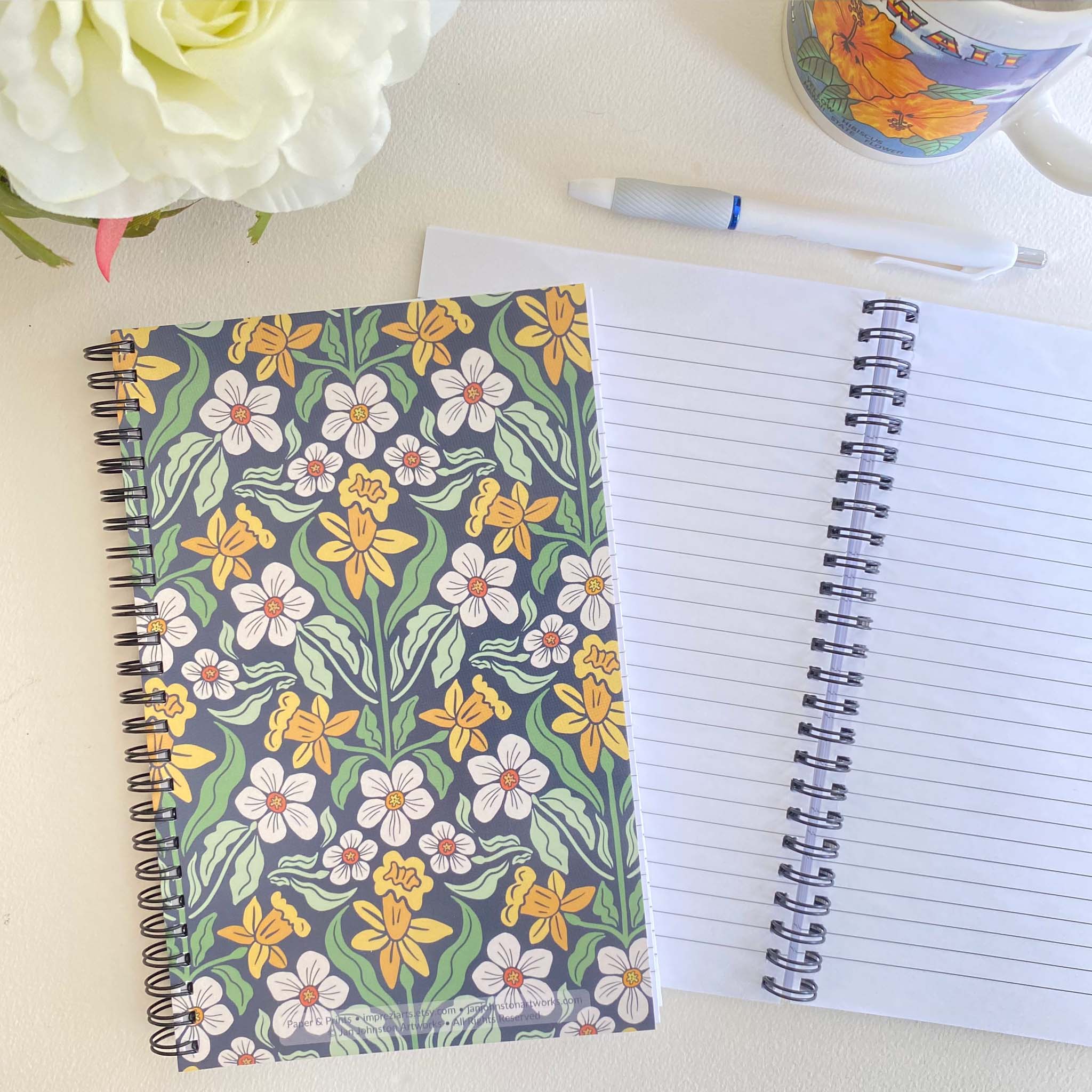 Daffodils & Jonquil Soft Cover Notebook is 5.5 x 8.5 inches and 80 College Ruled Pages.