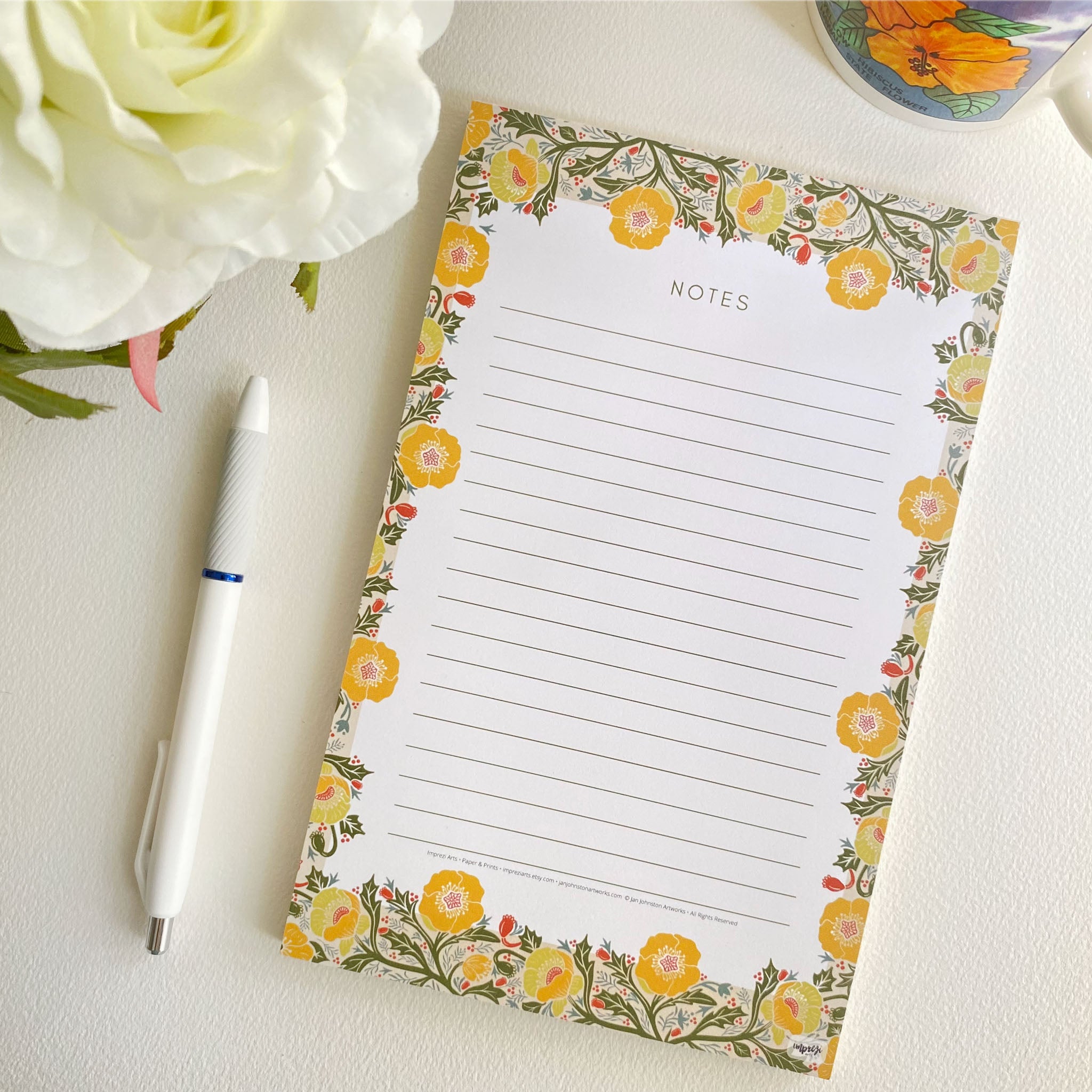 Yellow Poppy Flower Notepads, 5.5 x 8.5 inches, 50 lined pages on easy to write paper.