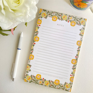 Yellow Poppy Flower Notepads, 5.5 x 8.5 inches, 50 lined pages on easy to write paper.