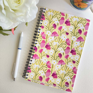 Sweet Pea & Daisy Flowers Soft Cover Notebook is 5.5 x 8.5 inches and 80 College Ruled Pages.
